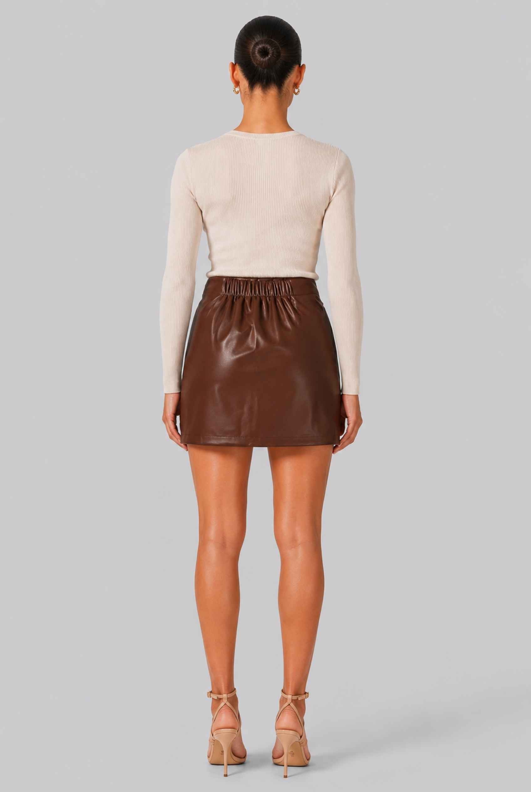 Virtual Model wearing The Sienna Tied Leather Mini Skirt Tie-Front Faux Leather Brown Mini Skirt