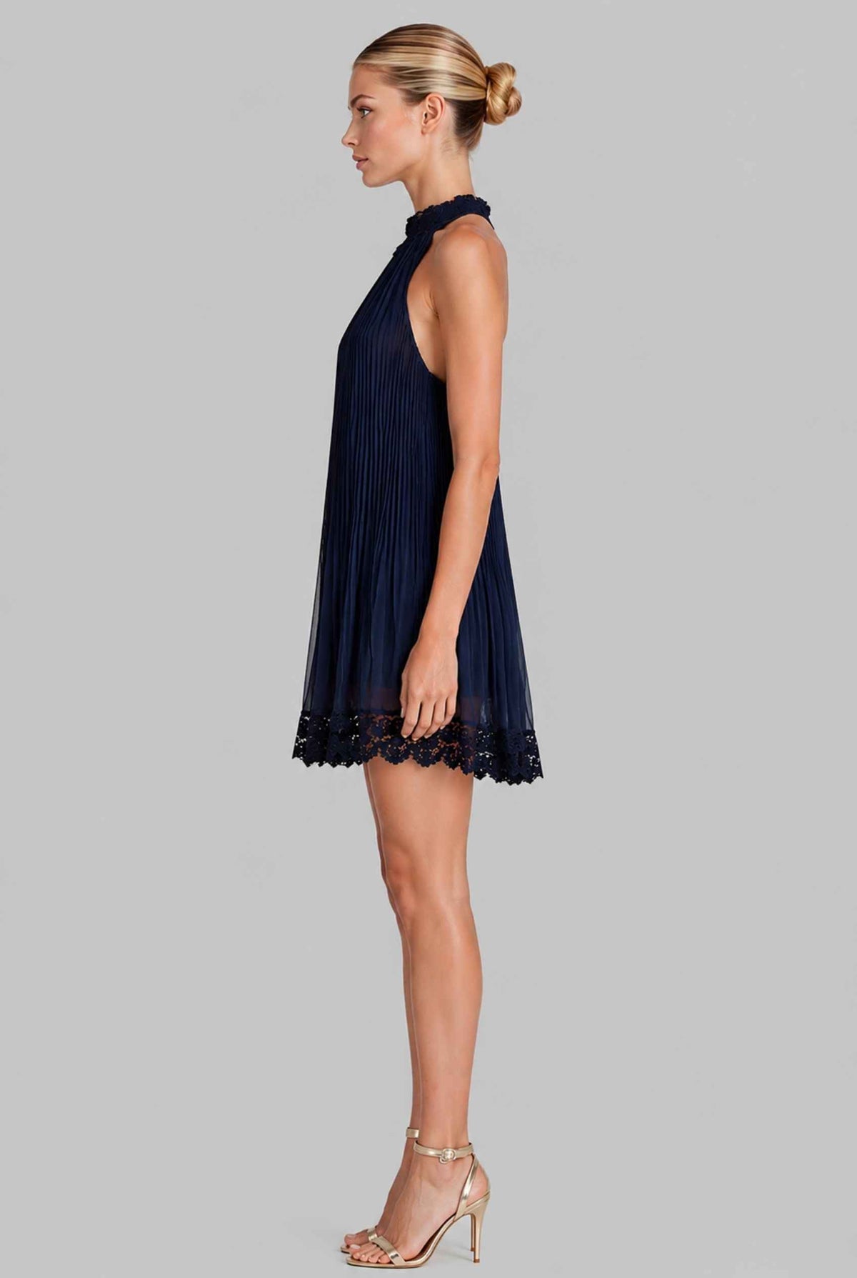 Virtual model wearing The Stella Swing Dress Pleated High-Neck Dress with Lace Trim in Navy