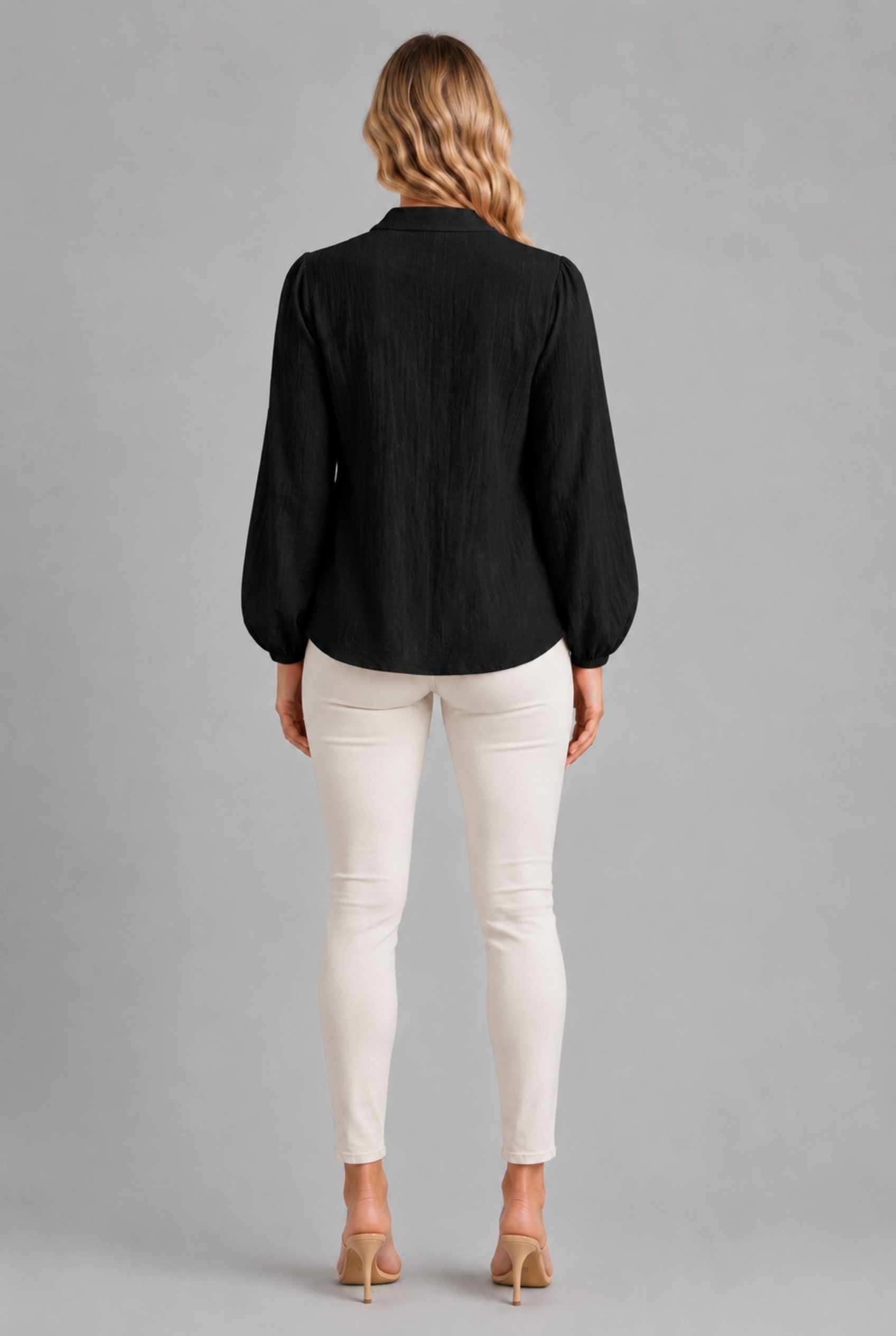 Virtual Model wearing The Sutton Peplum Blouse Black Smocked Button-Down Top
