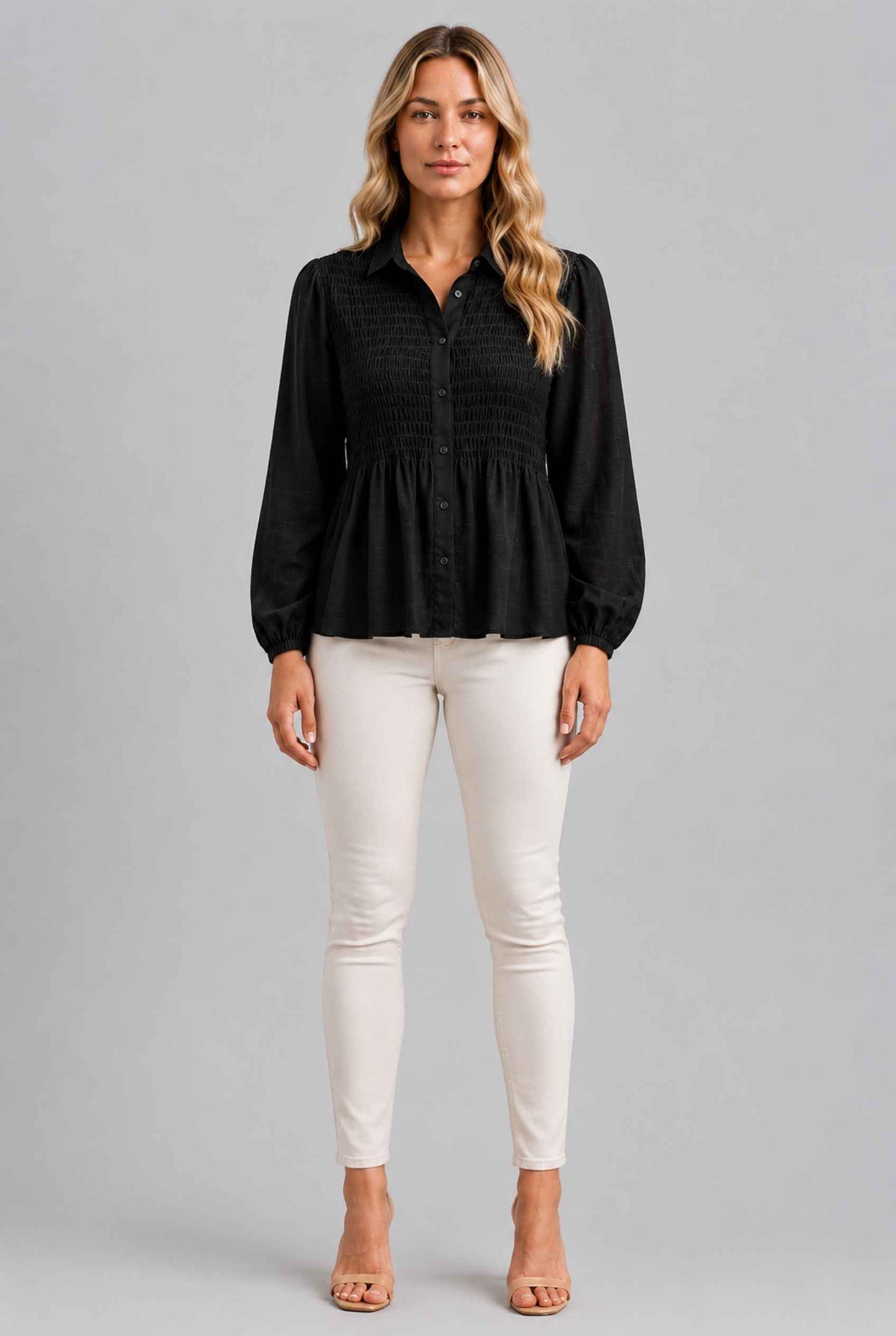 Virtual Model wearing The Sutton Peplum Blouse Black Smocked Button-Down Top