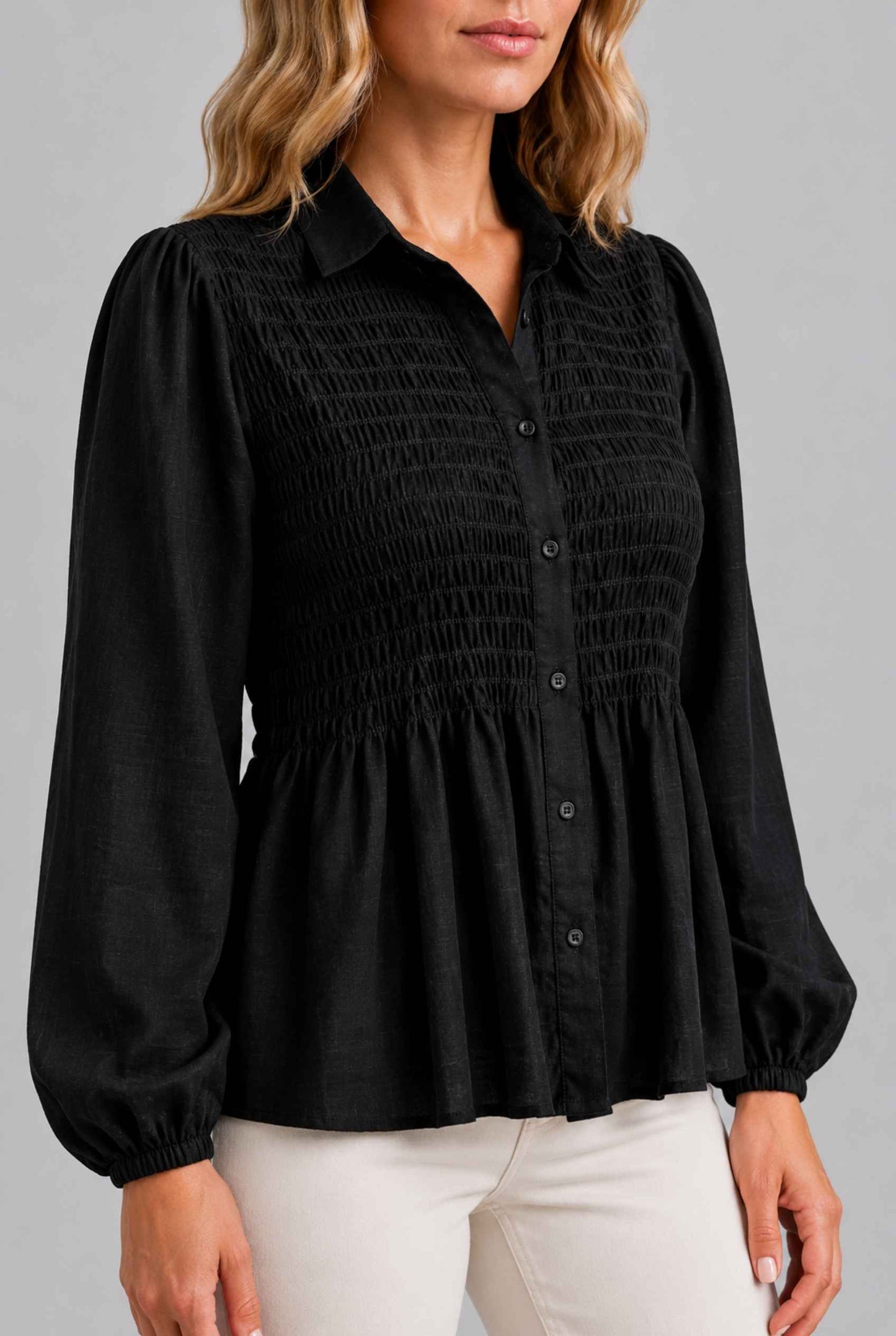 Virtual Model wearing The Sutton Peplum Blouse Black Smocked Button-Down Top