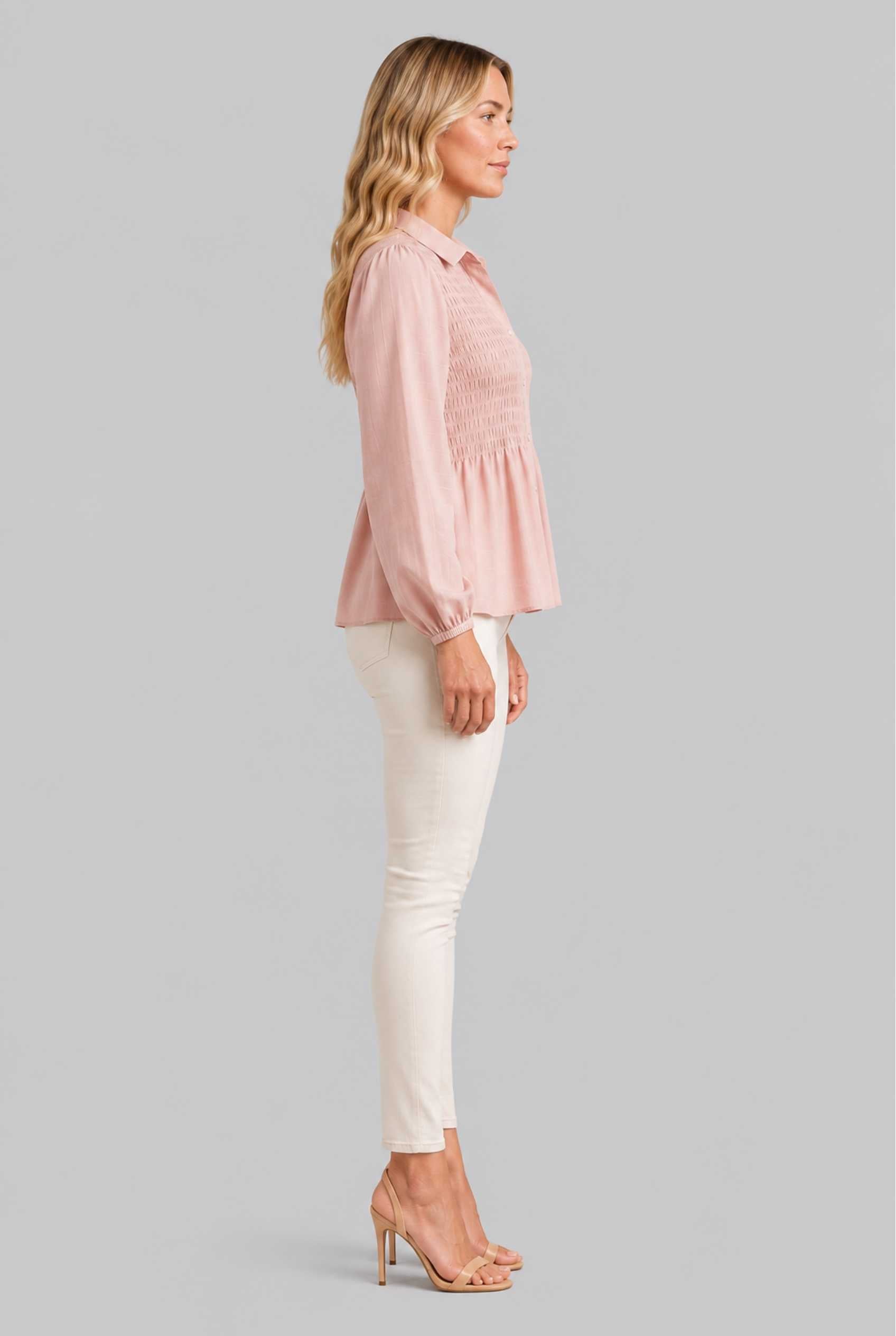 Virtual Model wearing The Sutton Peplum Blouse Blush Pink Smocked Button-Down Top
