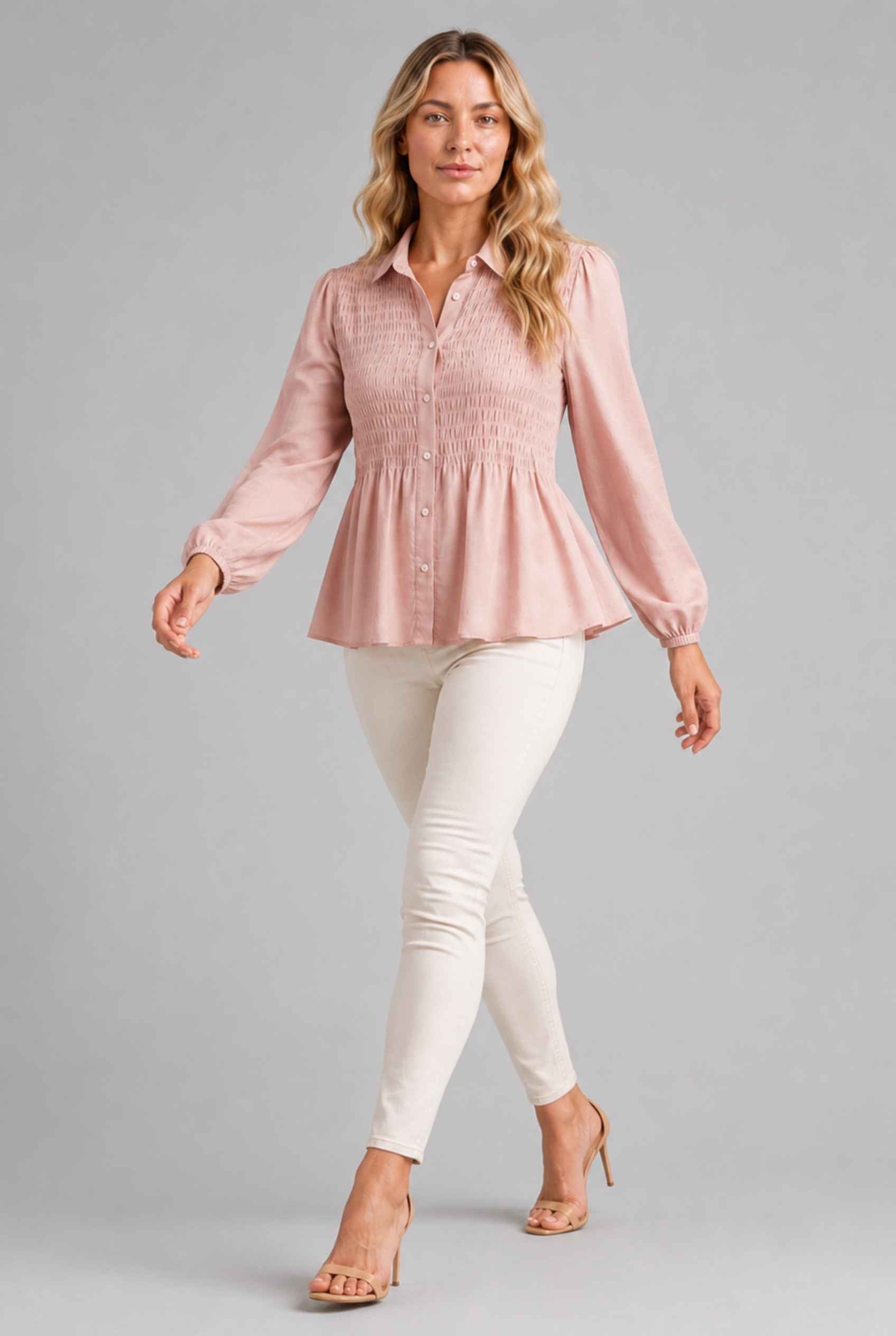 Virtual Model wearing The Sutton Peplum Blouse Blush Pink Smocked Button-Down Top