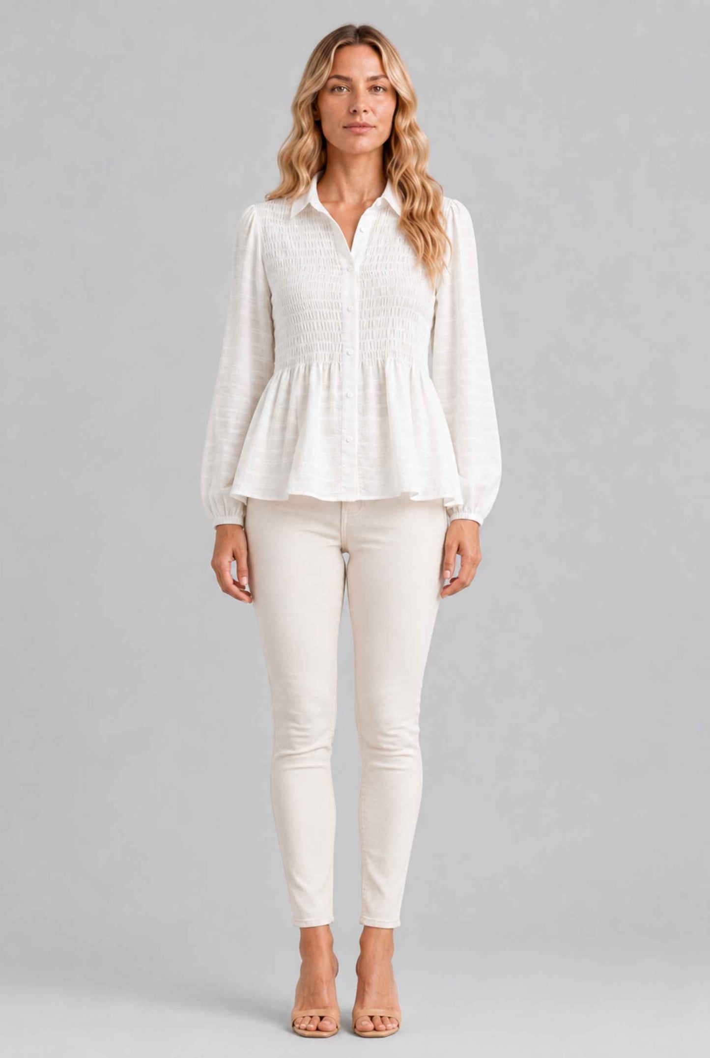 Virtual Model wearing The Sutton Peplum Blouse White Smocked Button-Down Top