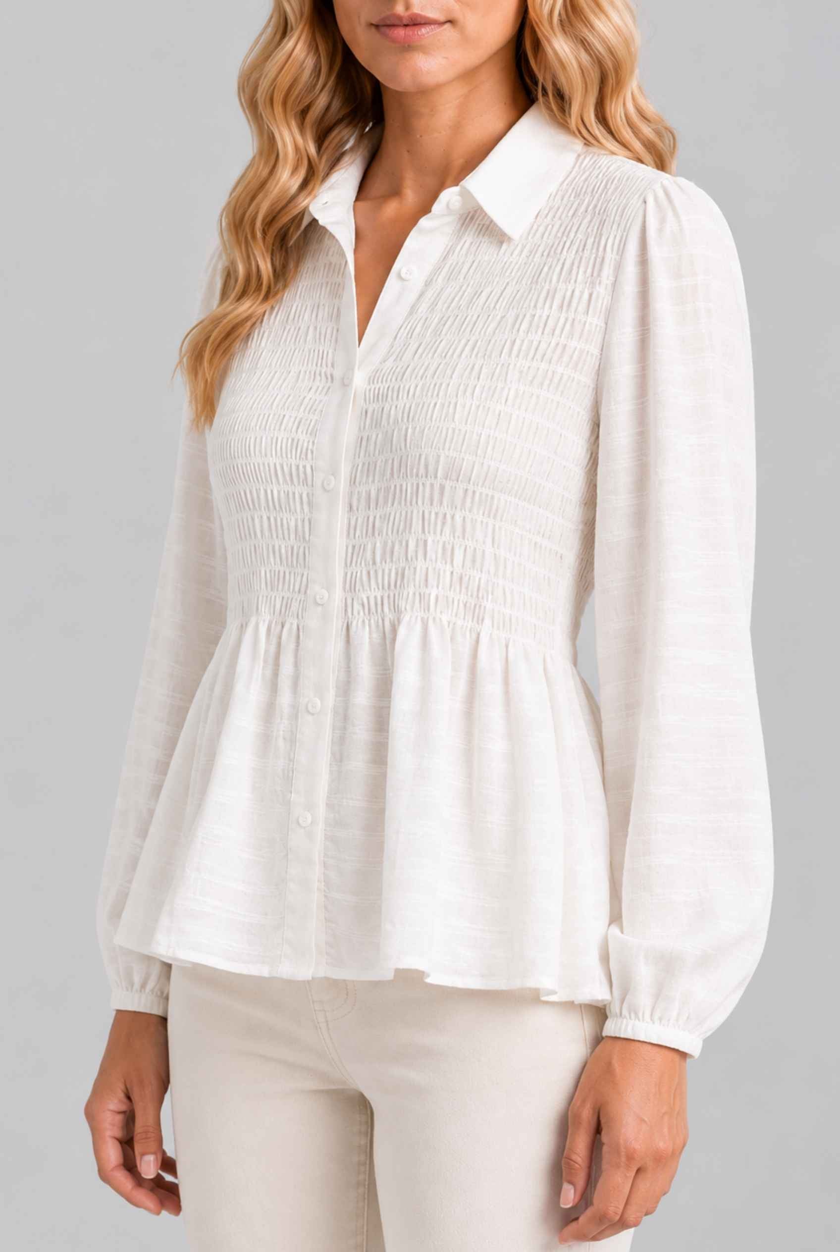 Virtual Model wearing The Sutton Peplum Blouse White Smocked Button-Down Top