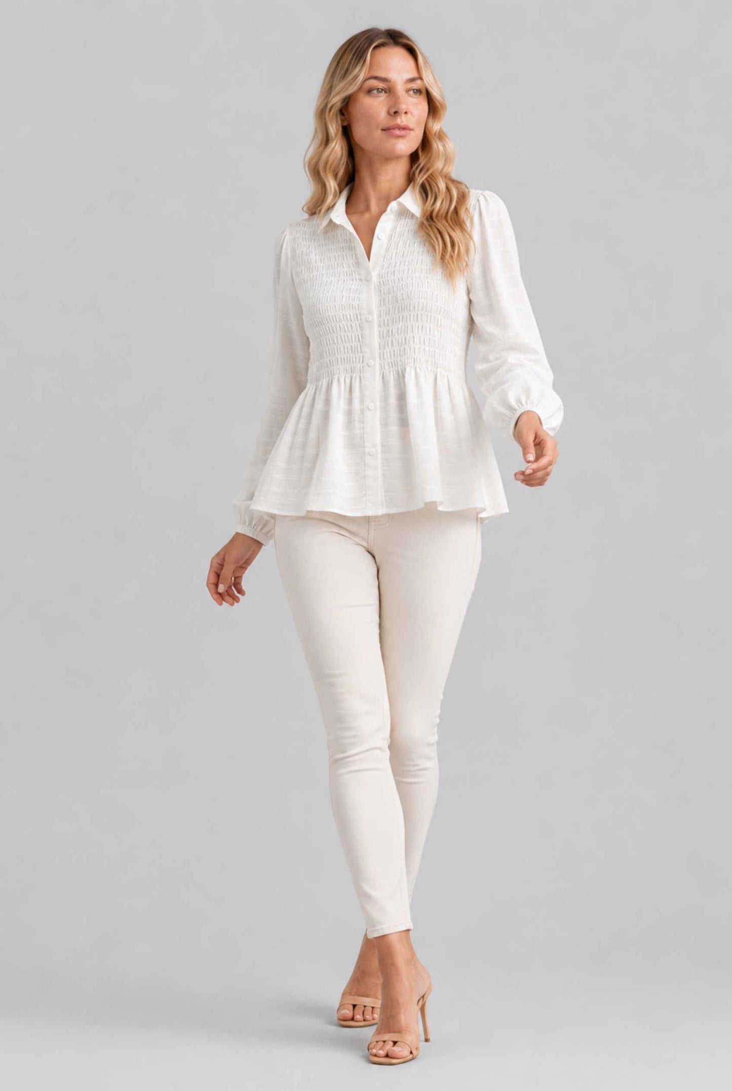 Virtual Model wearing The Sutton Peplum Blouse White Smocked Button-Down Top