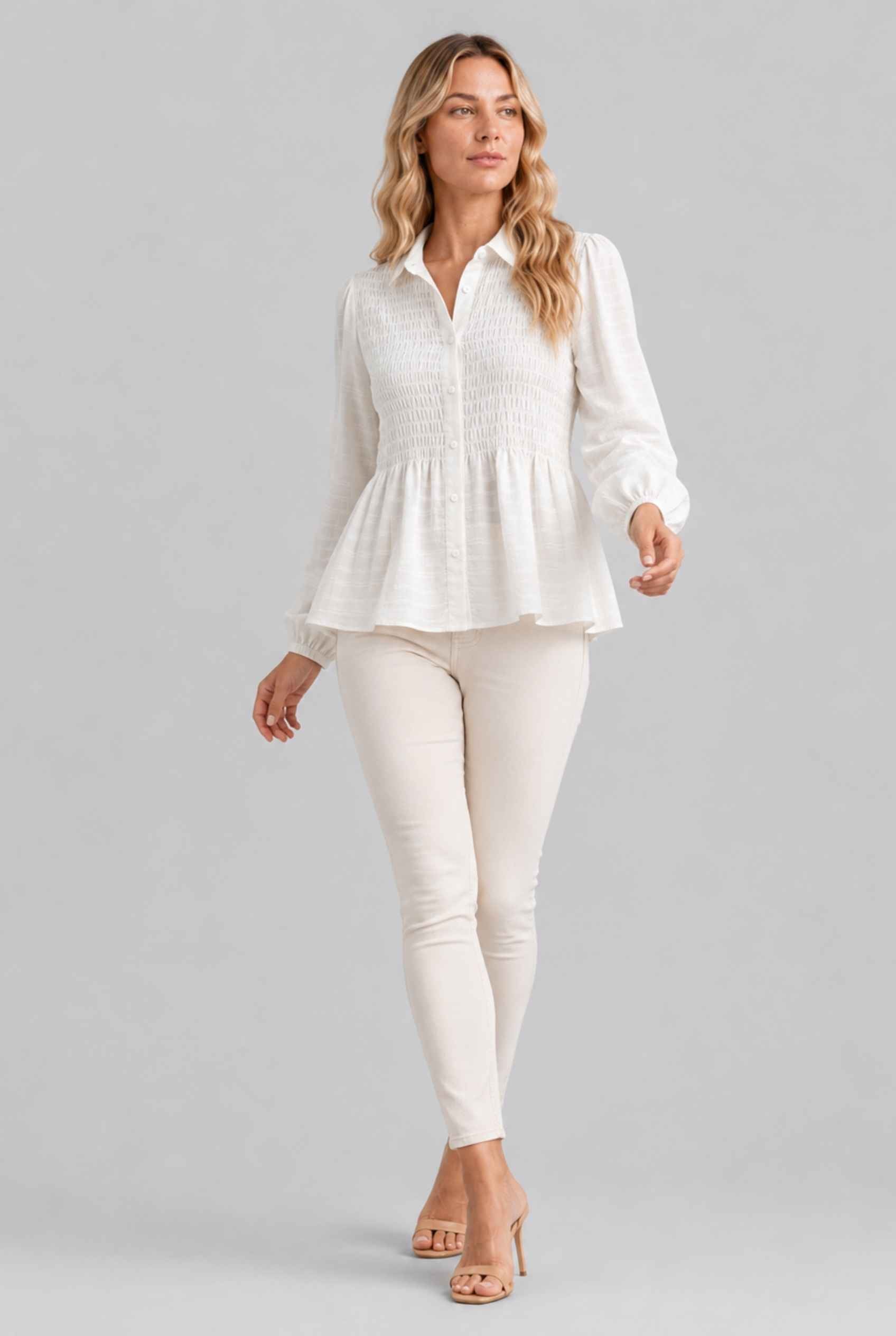 Virtual Model wearing The Sutton Peplum Blouse White Smocked Button-Down Top