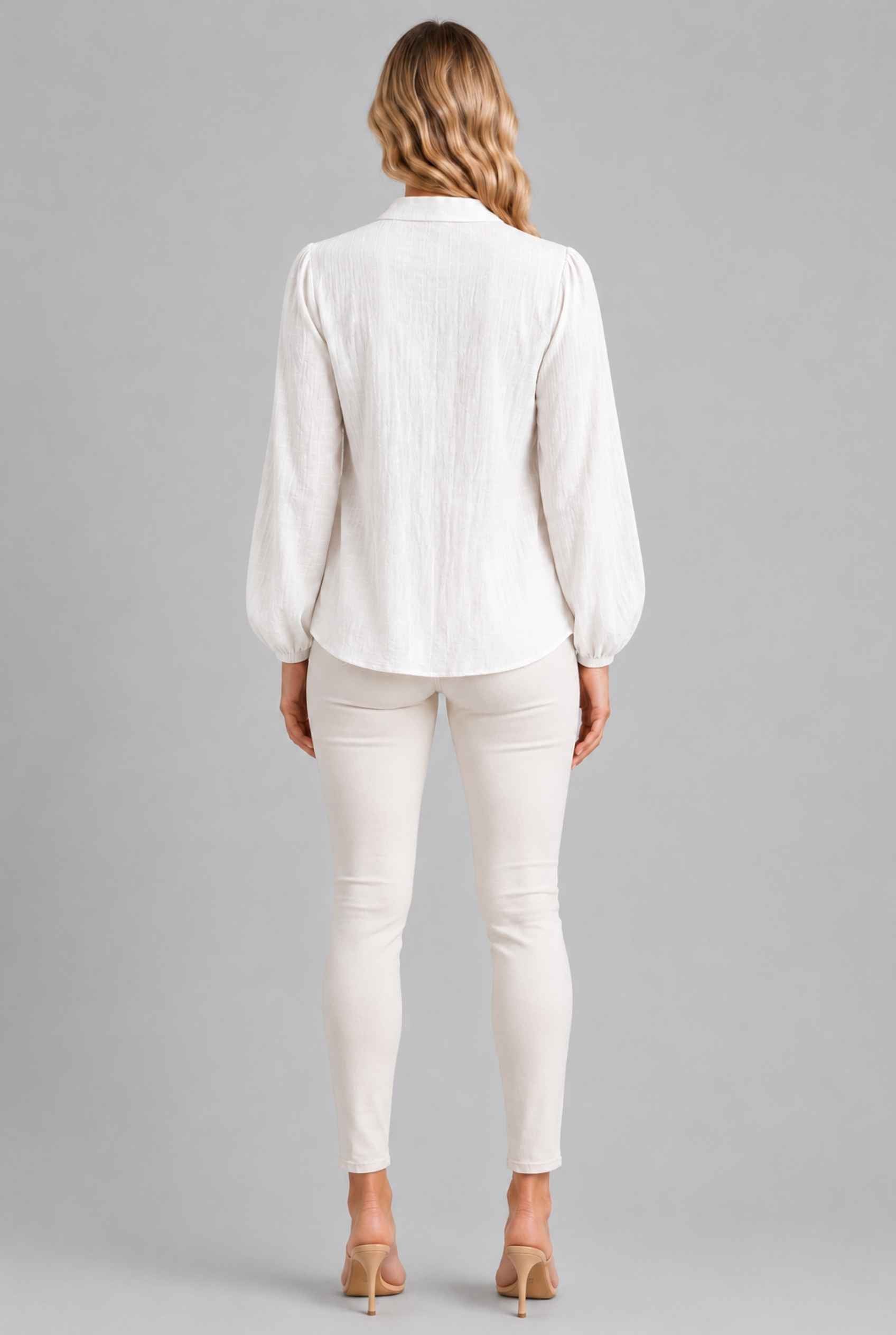 Virtual Model wearing The Sutton Peplum Blouse White Smocked Button-Down Top