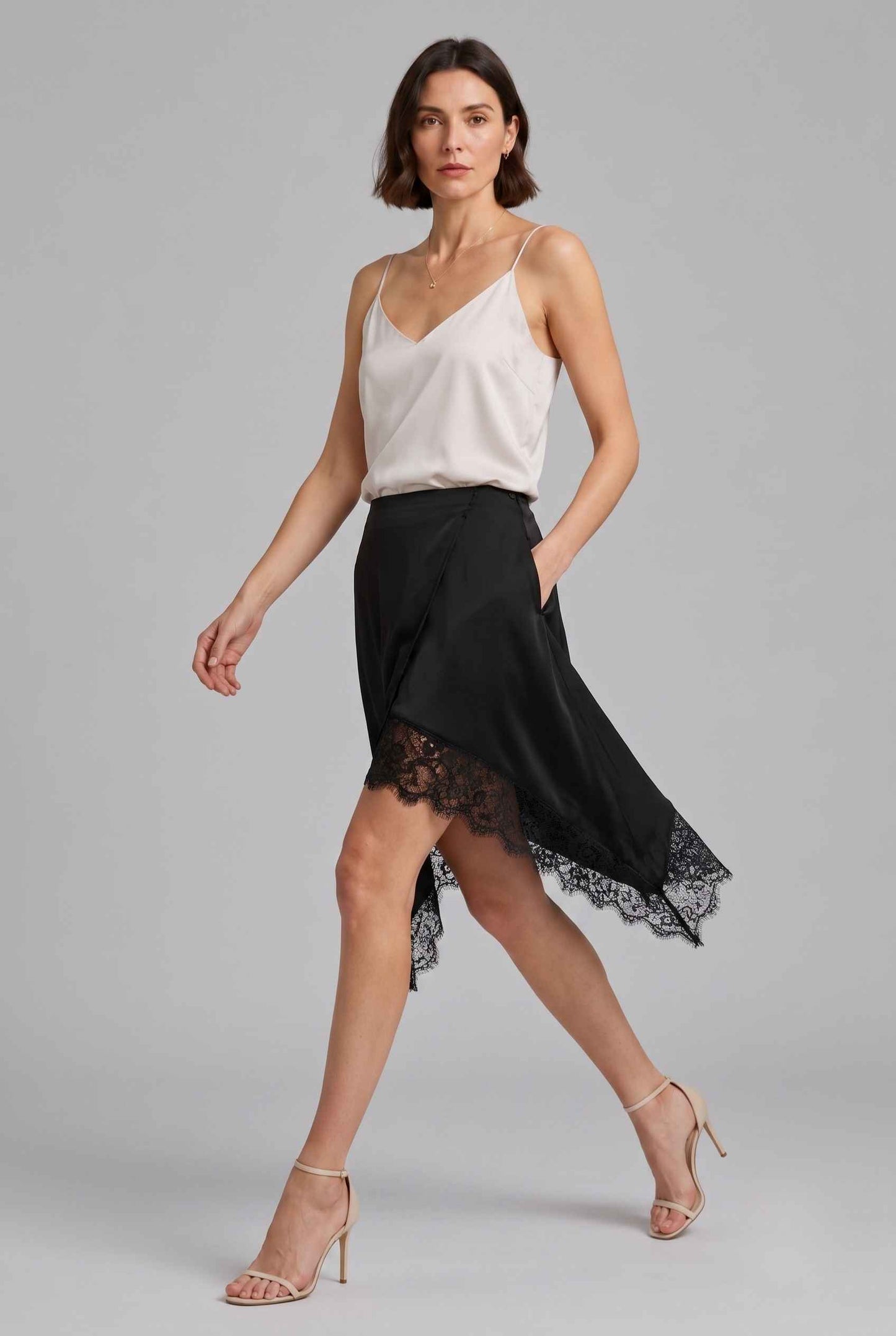 Virtual Model Wearing The Vera Lace Satin Mini Skirt Asymmetrical Lace Trim Wrap Black Skirt