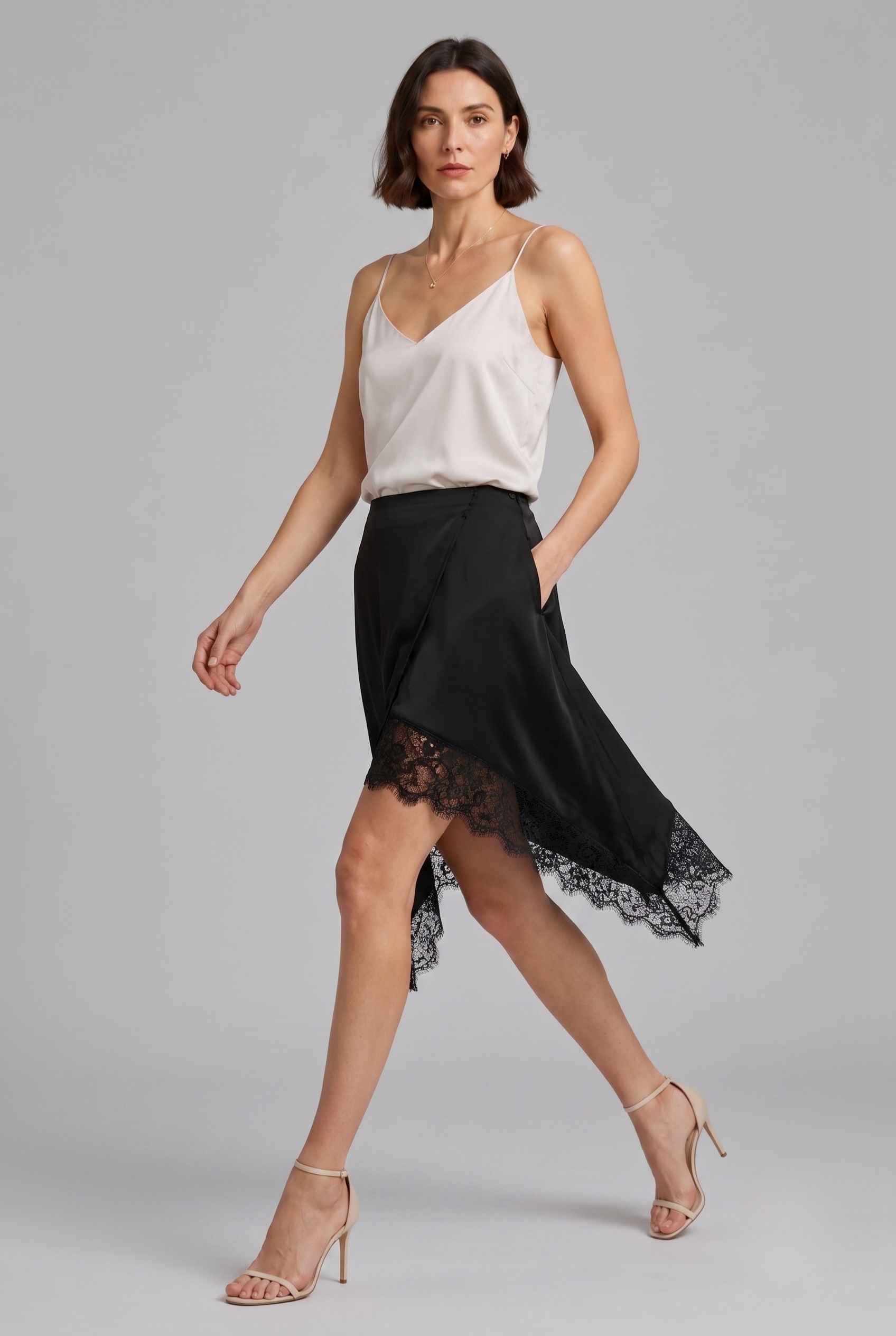 Virtual Model Wearing The Vera Lace Satin Mini Skirt Asymmetrical Lace Trim Wrap Black Skirt