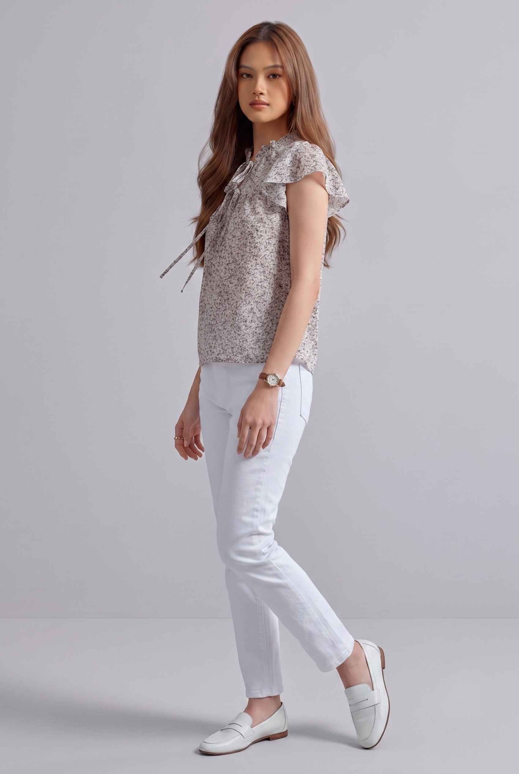 Virtual Model wearing The Vienna Ruffled Blouse Flutter Sleeve Lavender Floral Blouse