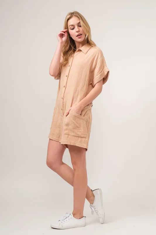 And The Why Washed Gauze Roll-up Sleeve Comfort Utility Romper in beige with pockets and a relaxed fit