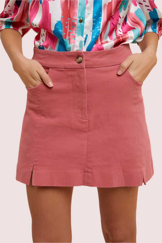 Annie Wear Comfort Stretch Cotton Slit Detailed Mini Skirt in pink with pockets and button closure