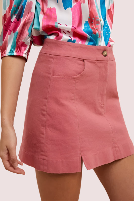 Annie Wear Comfort Stretch Cotton Slit Detailed Mini Skirt in pink with front pockets and button closure