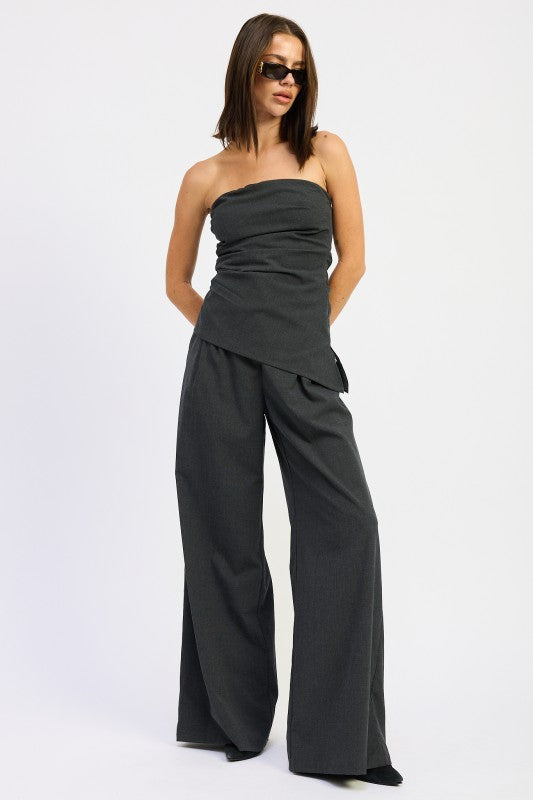 Stylish Emory Park Asymmetrical Bustier Tube Top in a sleek design paired with wide-leg pants