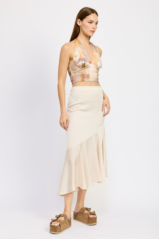 Emory Park model wearing beige Asymmetrical Ruffle Hem Skirt paired with floral halter top and platform sandals