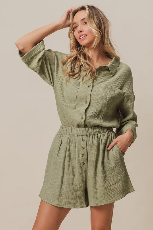 Woman wearing olive green BiBi Crinkle Gauze Shirt and Short Set with button details and relaxed fit