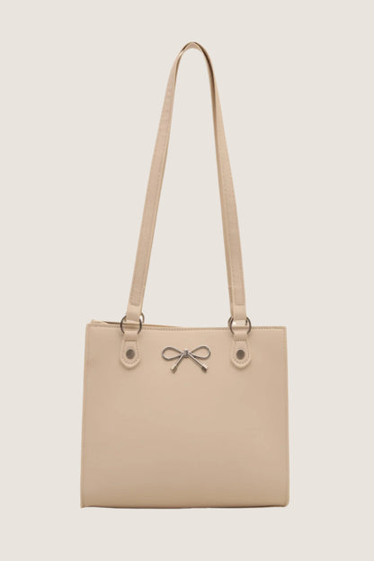 Bow detail shoulder bag in beige with elegant bow accent and adjustable straps