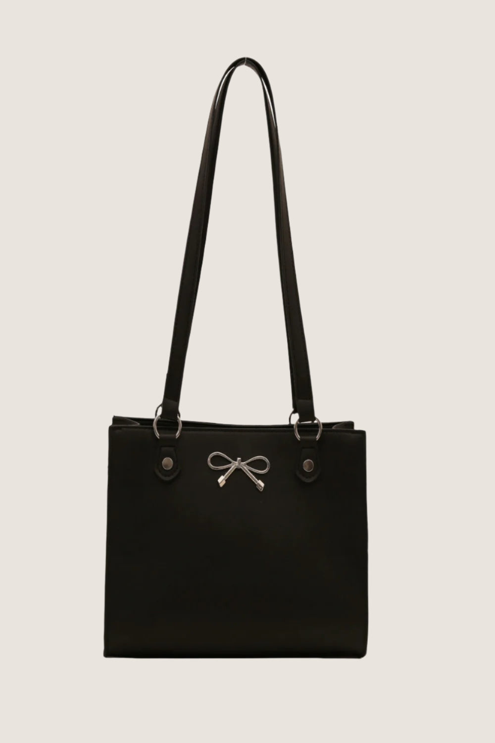 Elegant black bow detail shoulder bag with a sleek design and adjustable straps