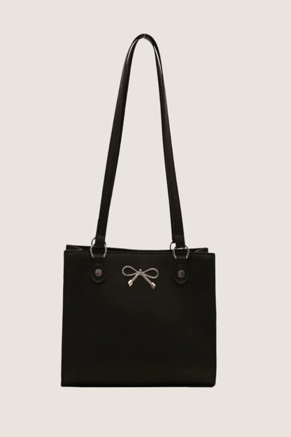 Elegant black bow detail shoulder bag with a sleek design and adjustable straps