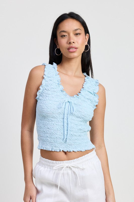 Emory Park light blue sleeveless ruffle top with textured fabric and tie front detail