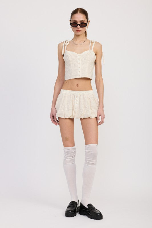 Emory Park Bubble Mini Skirt With Elastic Waistband in cream worn with matching crop top and thigh-high socks