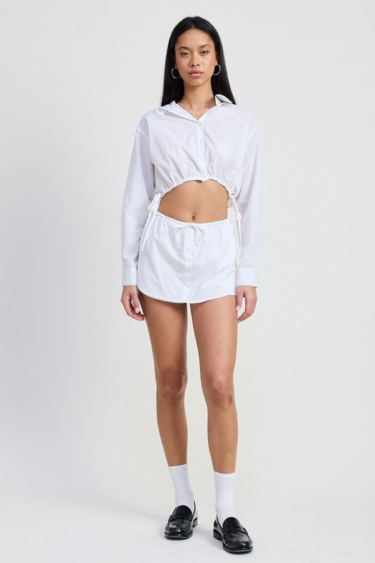 Emory Park white Cinched Mini Skort With Drawstring styled with matching cropped button-up shirt