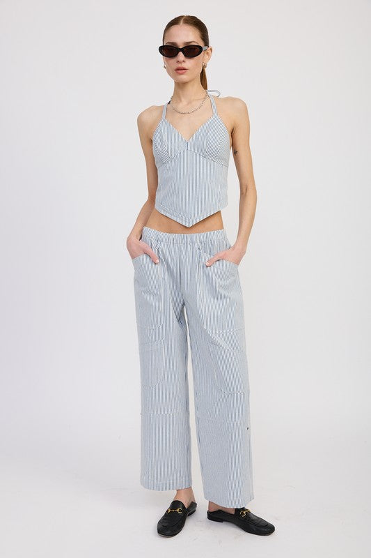 Emory Park Cinched Twill Pants With Wide Leg in light blue worn with matching sleeveless top and black loafers