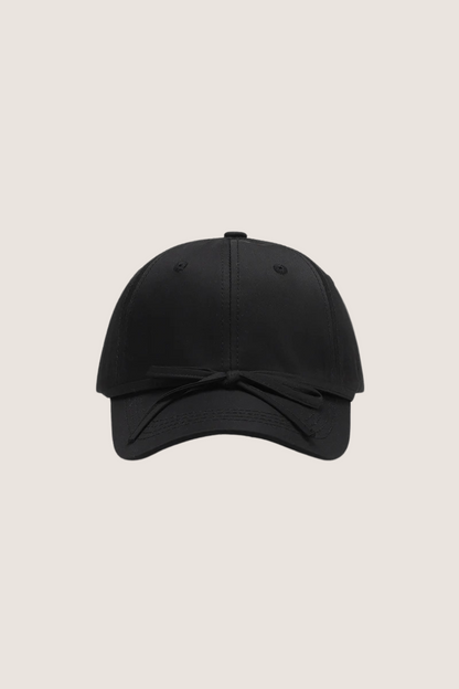 Classic cotton baseball cap in black with a simple design and adjustable strap for casual wear