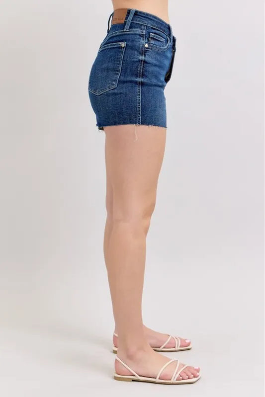 Side view of Criss-Cross Waist Denim Shorts in dark blue, perfect for stylish summer outfits