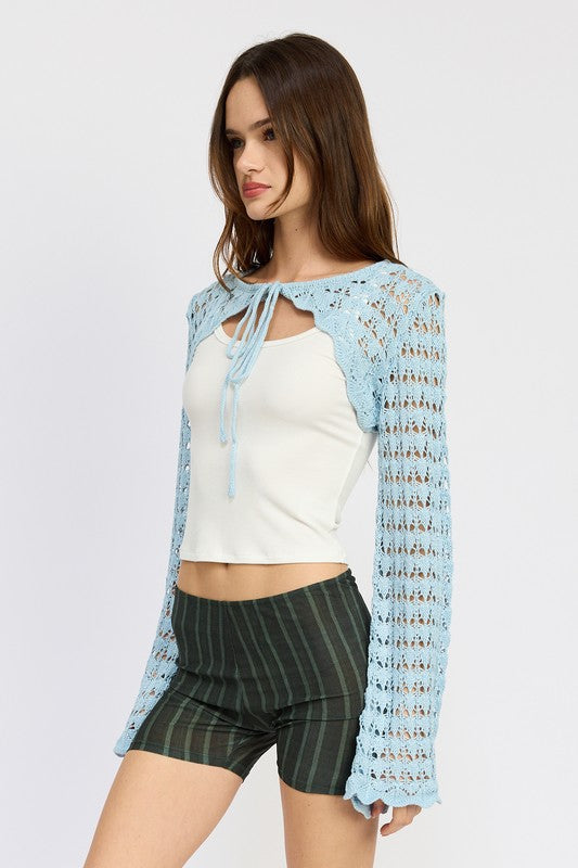 Emory Park light blue Crochet Bolero With Drawstrings worn over white tank top and striped shorts close side