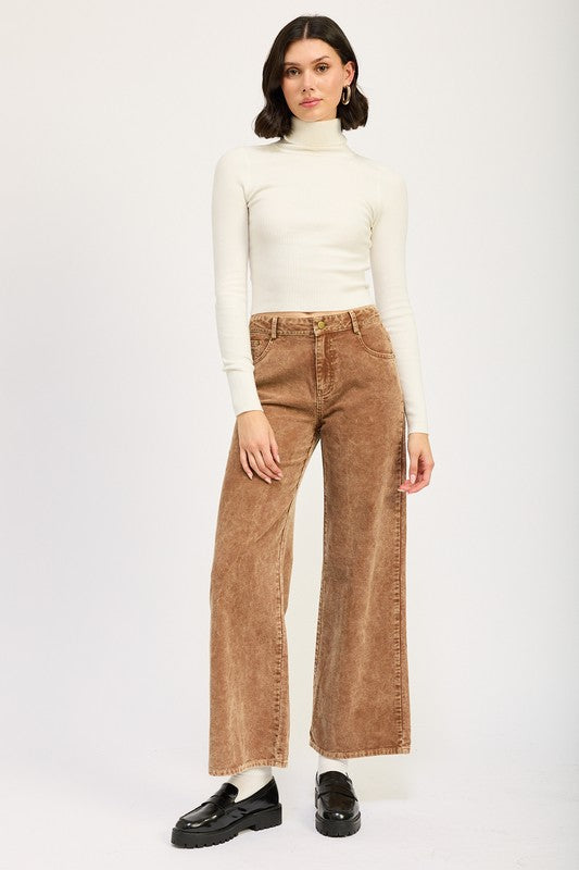 Emory Park model wearing Distressed Corduroy Pants high rise wide leg brown vintage wash