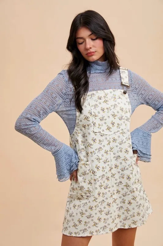 Ditsy Print Overall Mini Dress layered over a blue top, perfect for casual style and summer outings
