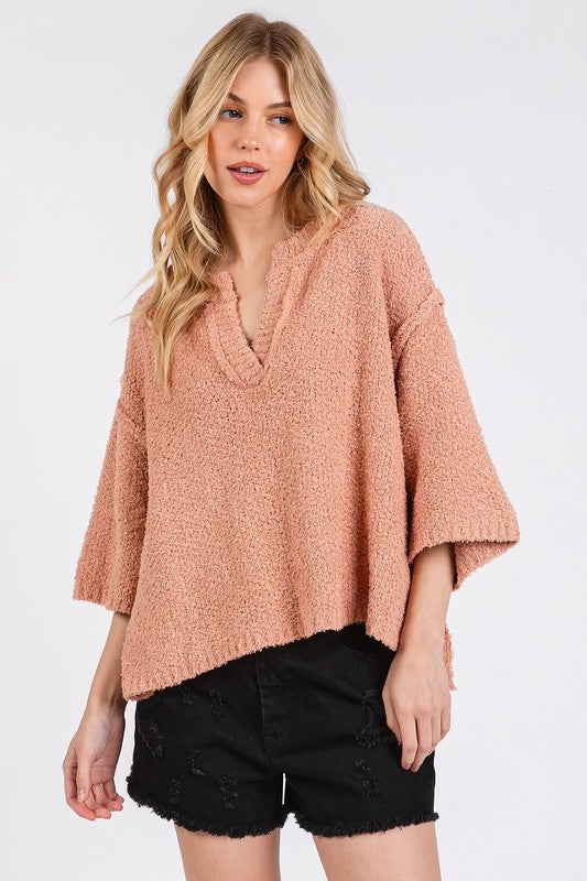 Drop Shoulder Side Slit Sweater in Light Pink, featuring a relaxed fit and textured fabric
