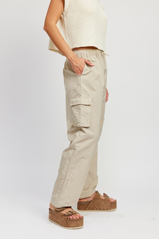 Emory Park beige cargo Straight Leg Pants With Elastic Waistband on model wearing cropped knit top and platform sandals