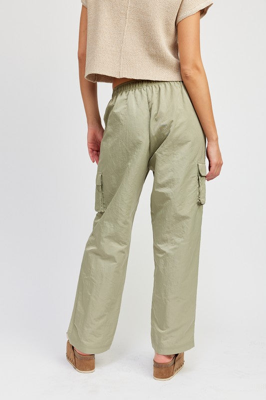 Emory Park olive cargo Straight Leg Pants With Elastic Waistband rear view with side pockets and casual sandals