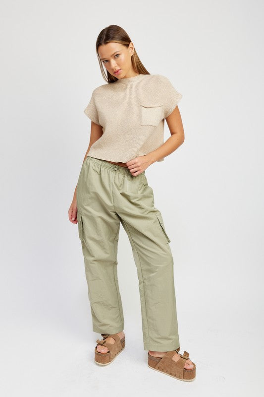 Emory Park model wearing sage cargo Straight Leg Pants With Elastic Waistband and beige top