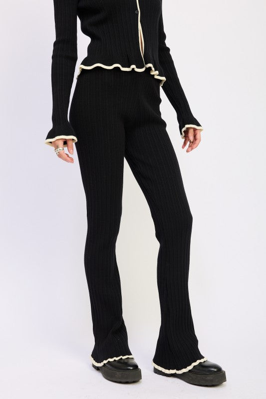 Emory Park Flared Knit Pant With Lettuce Hem black ribbed flared pants with cream lettuce trim at waist cuffs and ankles