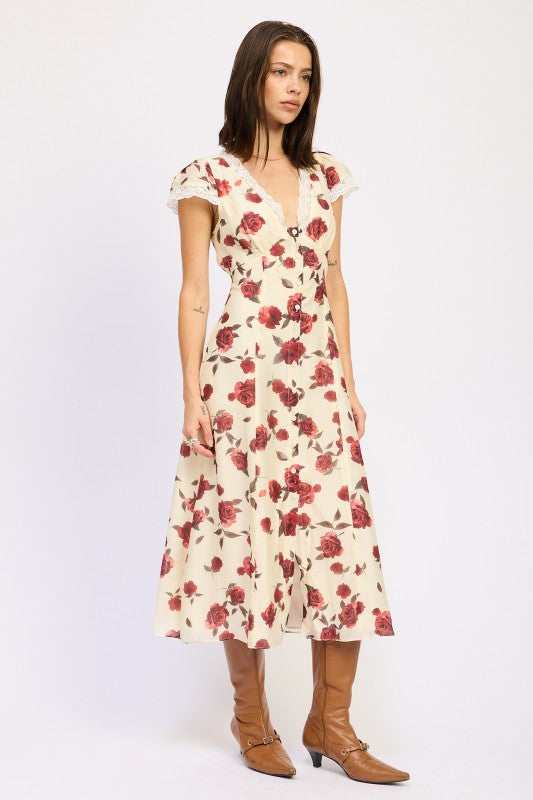 Floral Midi Dress With Lace Detail cream dress with red rose print lace cap sleeves and V neck paired with brown boots by Emory Park