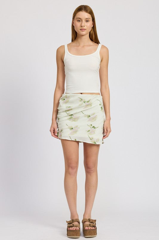 Emory Park floral pencil skirt with side slit worn with white tank top and wedge sandals