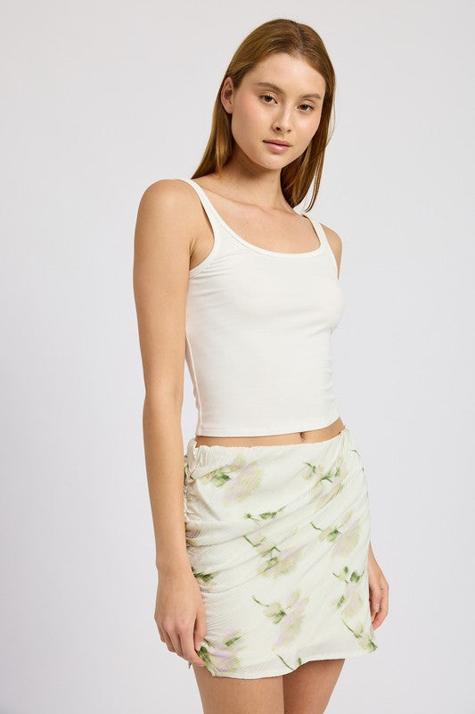 Emory Park Floral Pencil Skirt With Side Slit in light floral print worn with white tank top