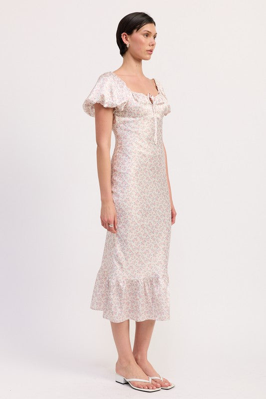 Emory Park Floral Puff Sleeve Midi Dress with soft floral pattern and ruffle hem worn by model