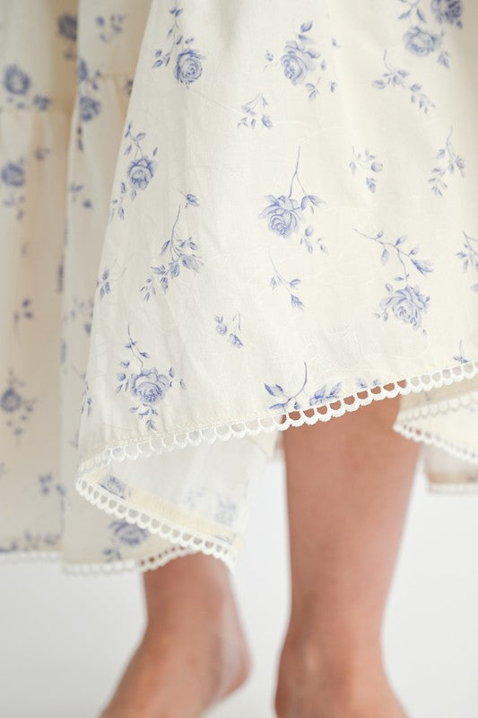 Emory Park Floral Tiered Maxi Skirt with delicate blue floral print and lace trim on white fabric