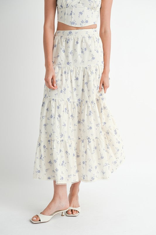 Emory Park Floral Tiered Maxi Skirt in white with blue floral print worn with matching crop top close up
