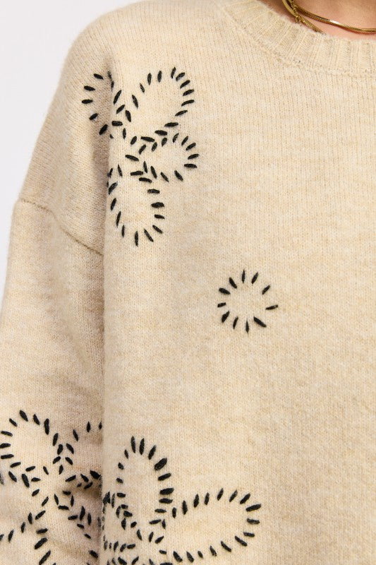 Emory Park Floral Whipstitch Sweater in beige with black floral embroidery details