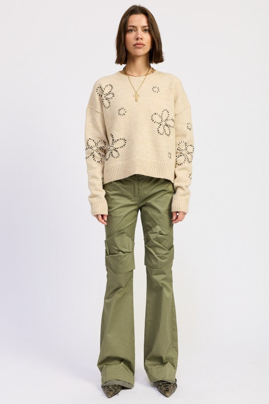 Emory Park Floral Whipstitch Sweater in Beige with Floral Design on a Model Styled with Olive Cargo Pants