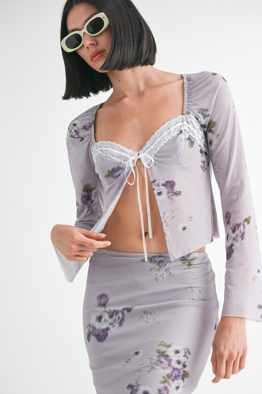 Emory Park Fly Away Floral Top With Lace in lavender with floral print and lace trim on model