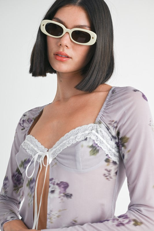Emory Park Fly Away Floral Top With Lace featuring sheer fabric purple floral print and white lace details
