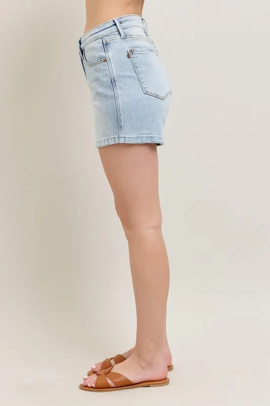 Side view of Frayed Hem Denim Shorts in light wash, perfect for casual summer outfits