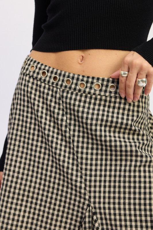 Emory Park Gingham Grommet Asymmetrical Skirt featuring trendy grommet detailing and a stylish checkered pattern